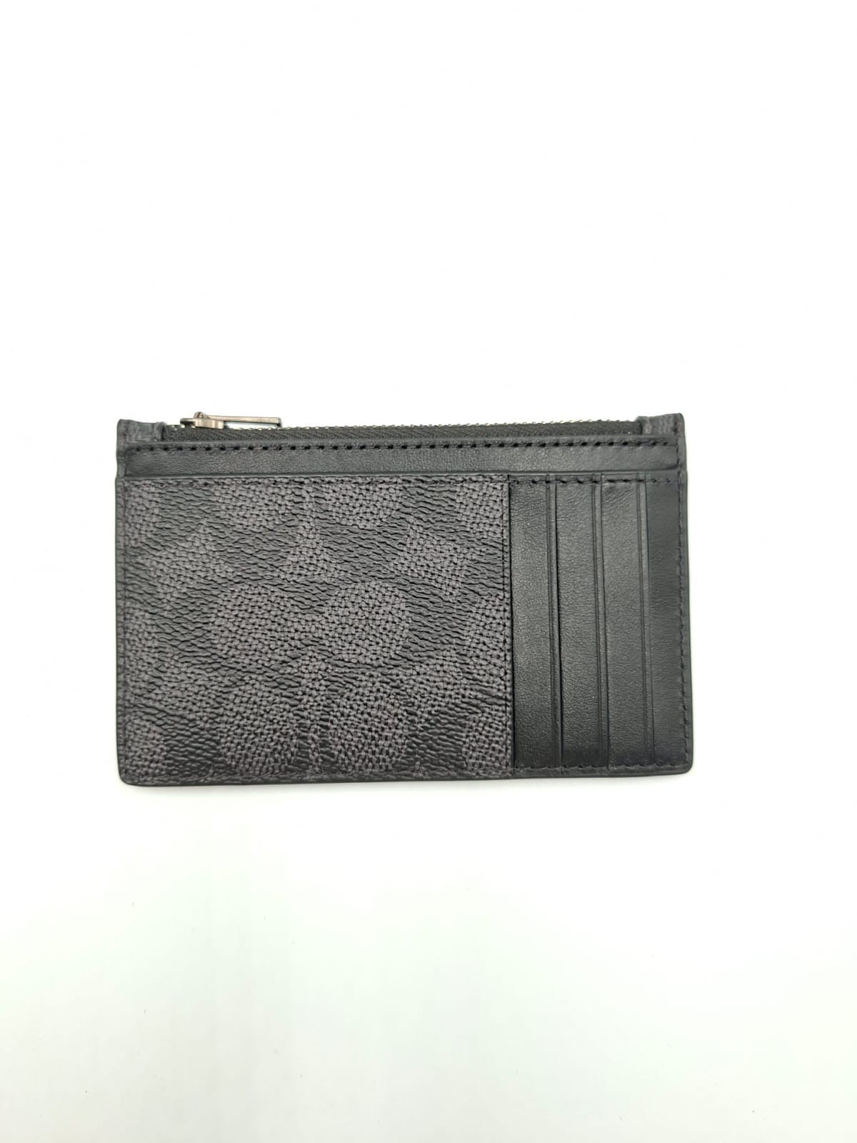 Tarjetero con cremallera Coach en lona de firma (Signature Canvas)
Coach Zip Card Case