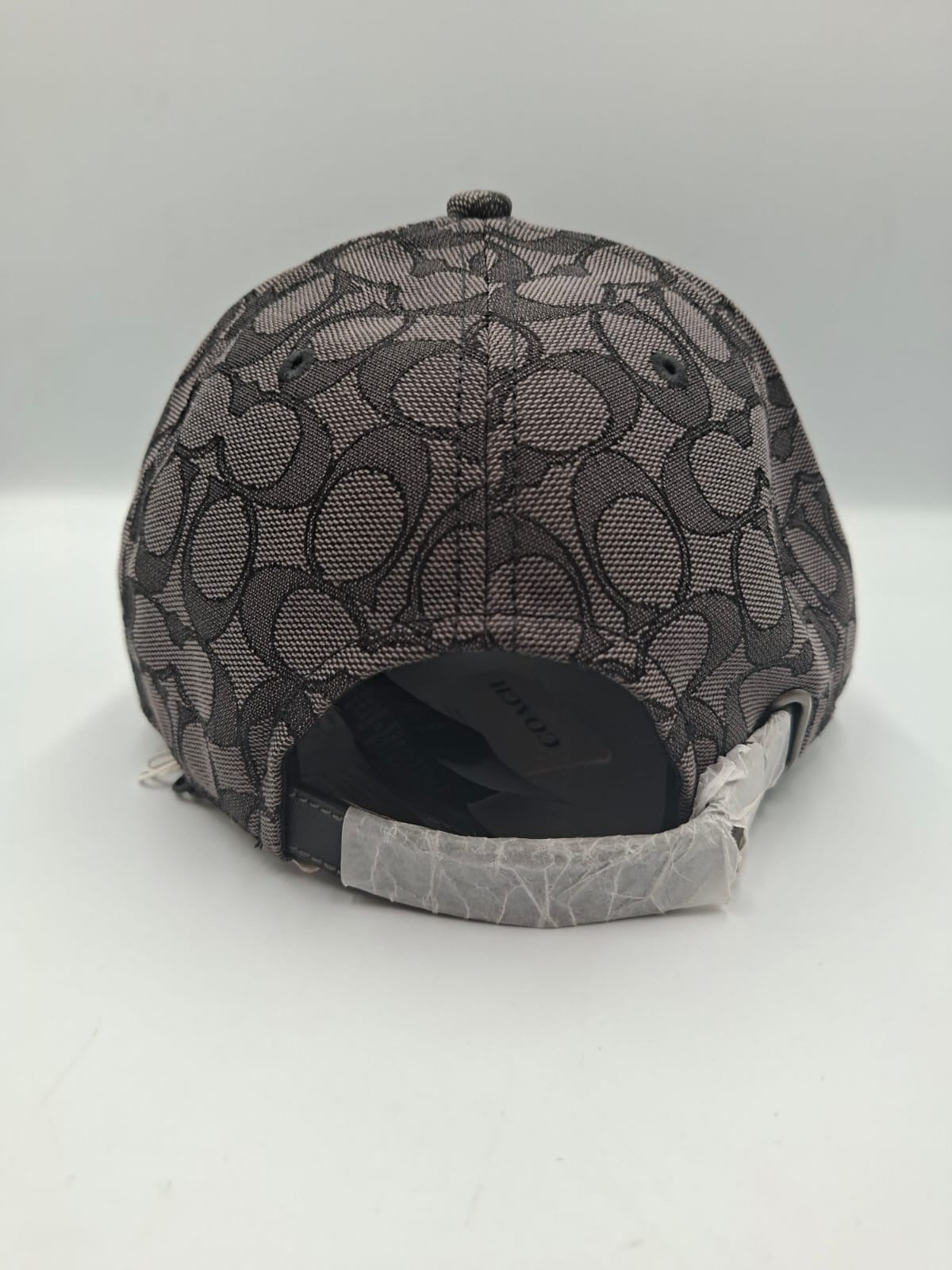 Gorra con el estampado de la firma (Signature) COACH