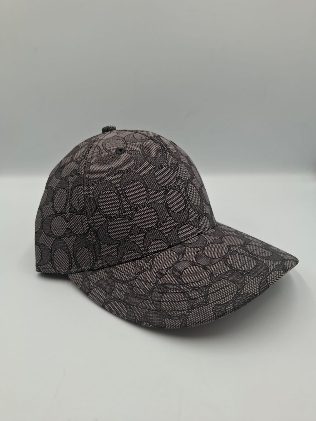 Gorra con el estampado de la firma (Signature) COACH