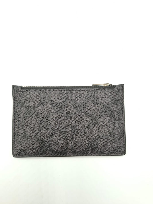 Tarjetero con cremallera Coach en lona de firma (Signature Canvas)
Coach Zip Card Case