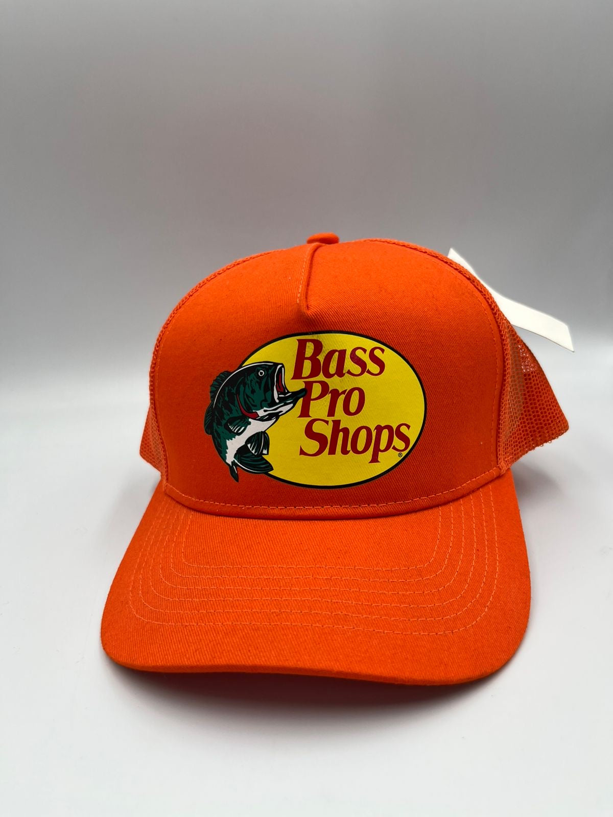 Gorra Bass Pro Shops Trucker Cap de color naranja con malla trasera
