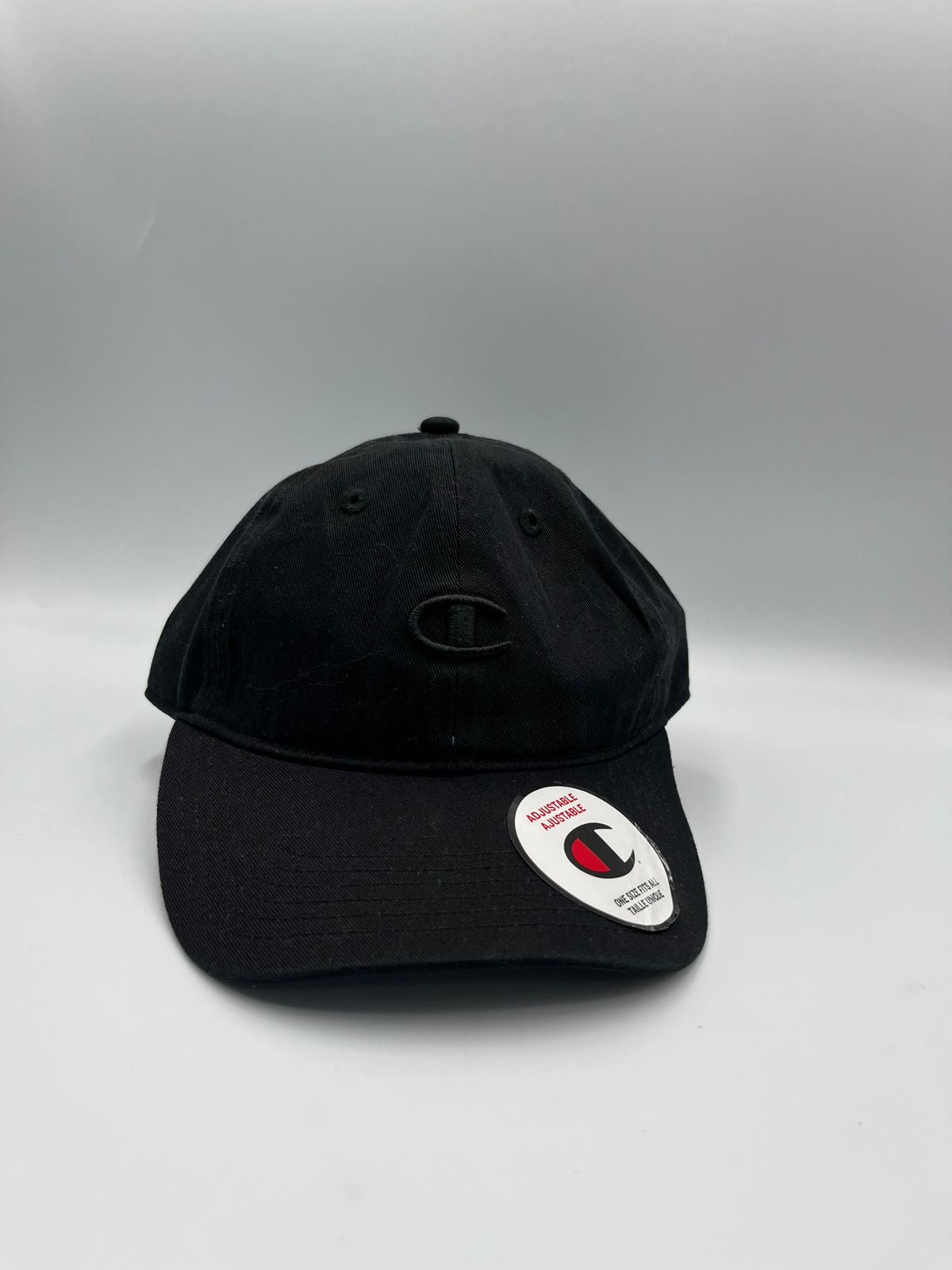 Champion Gorra con logo bordado, modelo clásico ajustable.