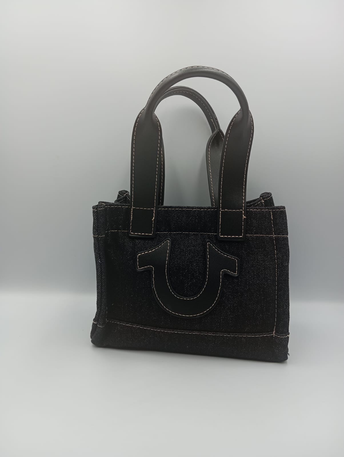 Mini bolso tipo Tote de mezclilla TRUE RELIGION
